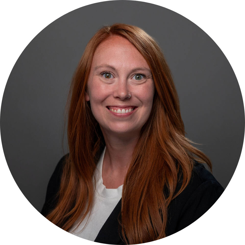 Genna Brong smiling for her GVSU professional photo.